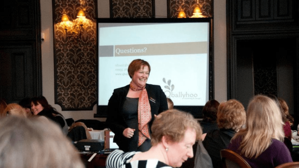 Drew speaking at an event about marketing strategies for small business owners