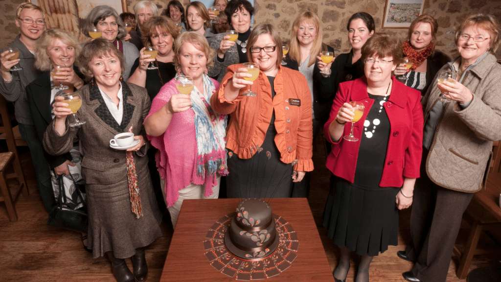 Drew and the Somerset Women in Business elebrating Qballyhoo's second birthday